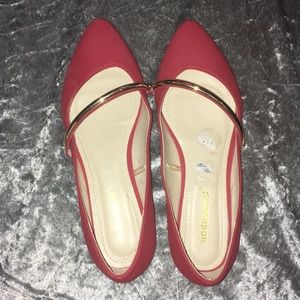 Red shoes with Gold accent strap